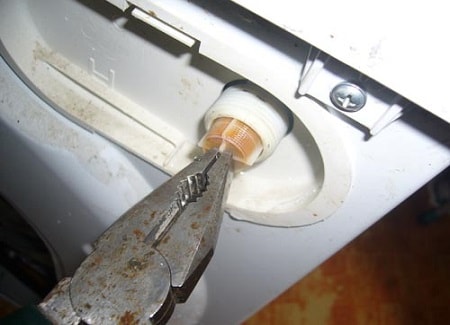 curățarea filtrului de intrare a mașinii de spălat